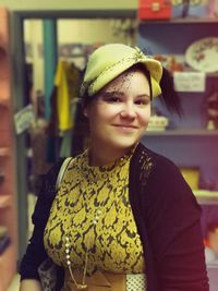 Portrait of smiling young woman standing outdoors