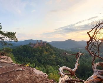 Scenic view of mountains against sky during sunset
