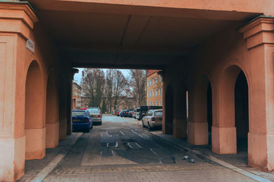 Road amidst buildings in city