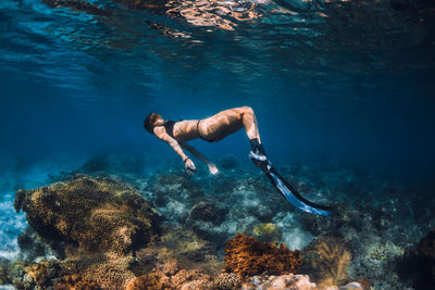 Man swimming in sea