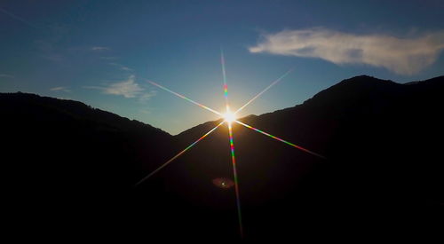 Low angle view of silhouette mountain against sky during sunset