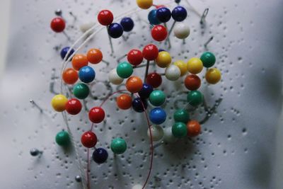 Close-up of multi colored candies on table