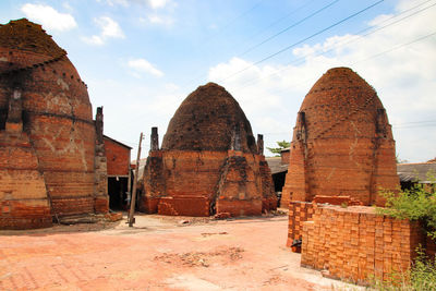 Traditional brick kiln against sky