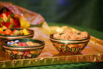 Close-up of multi colored candies on table