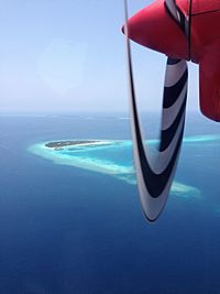 Scenic view of sea against blue sky