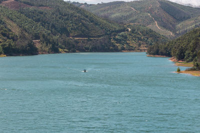 Scenic view of sea and mountains