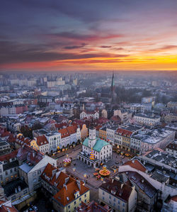 High angle view of city against sky during sunset