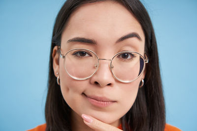 Close-up portrait of young woman