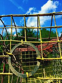 Low angle view of basketball hoop against sky