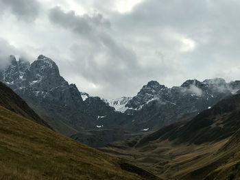 Scenic view of snowcapped mountains, kazbegi.