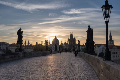Low angle view of buildings against sky during sunset