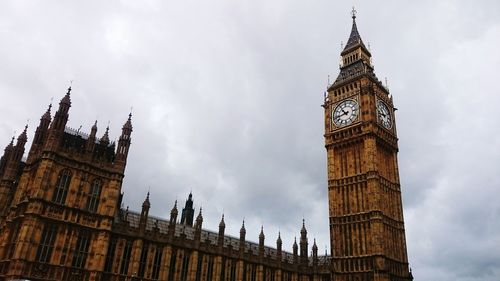 Low angle view of houses of parliament and big ben