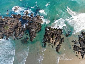 High angle view of rocks on beach