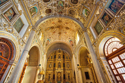 Low angle view of ornate ceiling in building