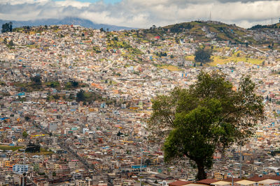 Aerial view of town against sky