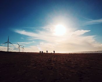 Scenic view of beach against sky during sunset
