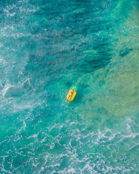 High angle view of people in sea