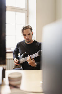 Man playing electric guitar