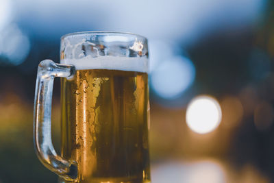 Close-up of beer glass on table