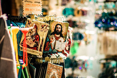 Close-up of souvenirs for sale in store