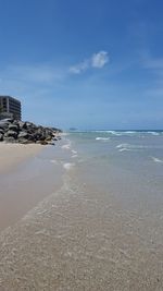 Scenic view of beach against sky