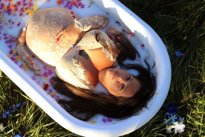 High angle view of young woman in plate