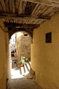 Alley amidst buildings in city