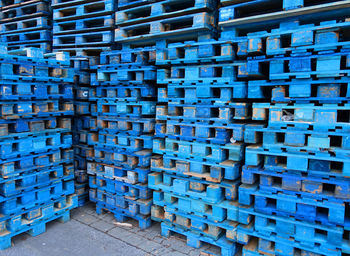 Full frame shot of blue wooden crates at warehouse