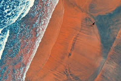 Person walking at beach