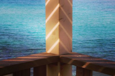 Close-up of wood against sea