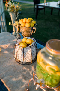 Close-up of fruits in glass jar on table