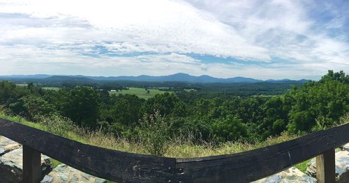 Scenic view of tree mountains against sky