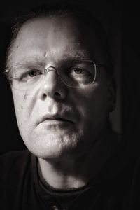 Portrait of man wearing eyeglasses