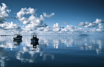 Ship in sea against sky