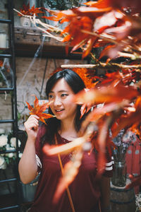 Portrait of young woman smiling