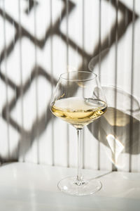 Close-up of wineglass on table