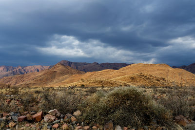 Scenic view of landscape and mountains against sky