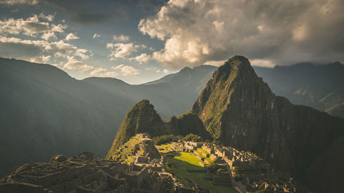 Panoramic view of mountain against cloudy sky