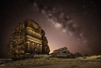 Low angle view of building against sky at night