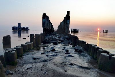 Scenic view of sea against sky during sunset