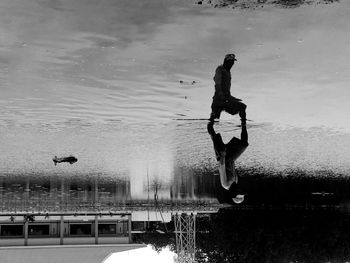 Full length of man fishing in river