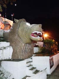 Statue of woman at night