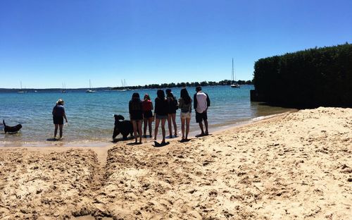 Scenic view of beach against clear sky