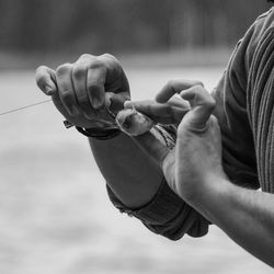 Close-up of man holding fish