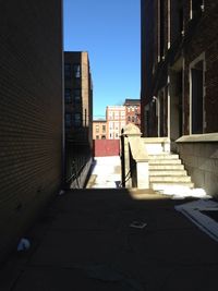 Narrow alley along buildings