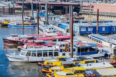 Boats moored on frozen river