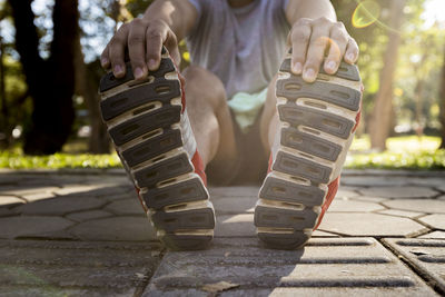 Low section of man on footpath