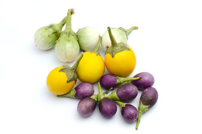 Close-up of fruits against white background