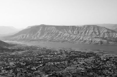 Scenic view of landscape and mountains against sky