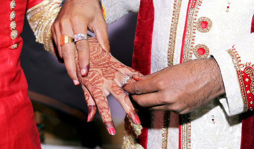 Midsection of woman with hands